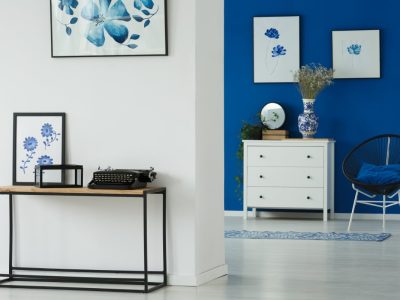 Flowery blue and white interior design of a living room