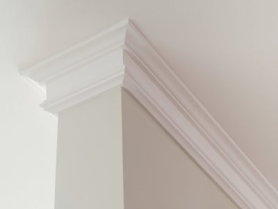 Ceiling moldings in the interior, a detail of intricate corner.