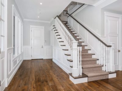 A wooden staircase in a new construction home in Encino, California