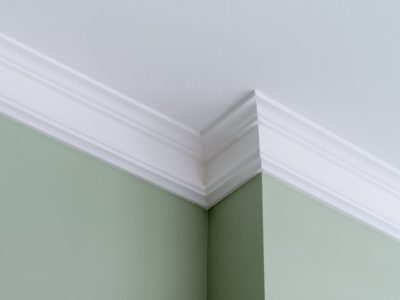 Ceiling moldings in the interior, a detail of intricate corner.